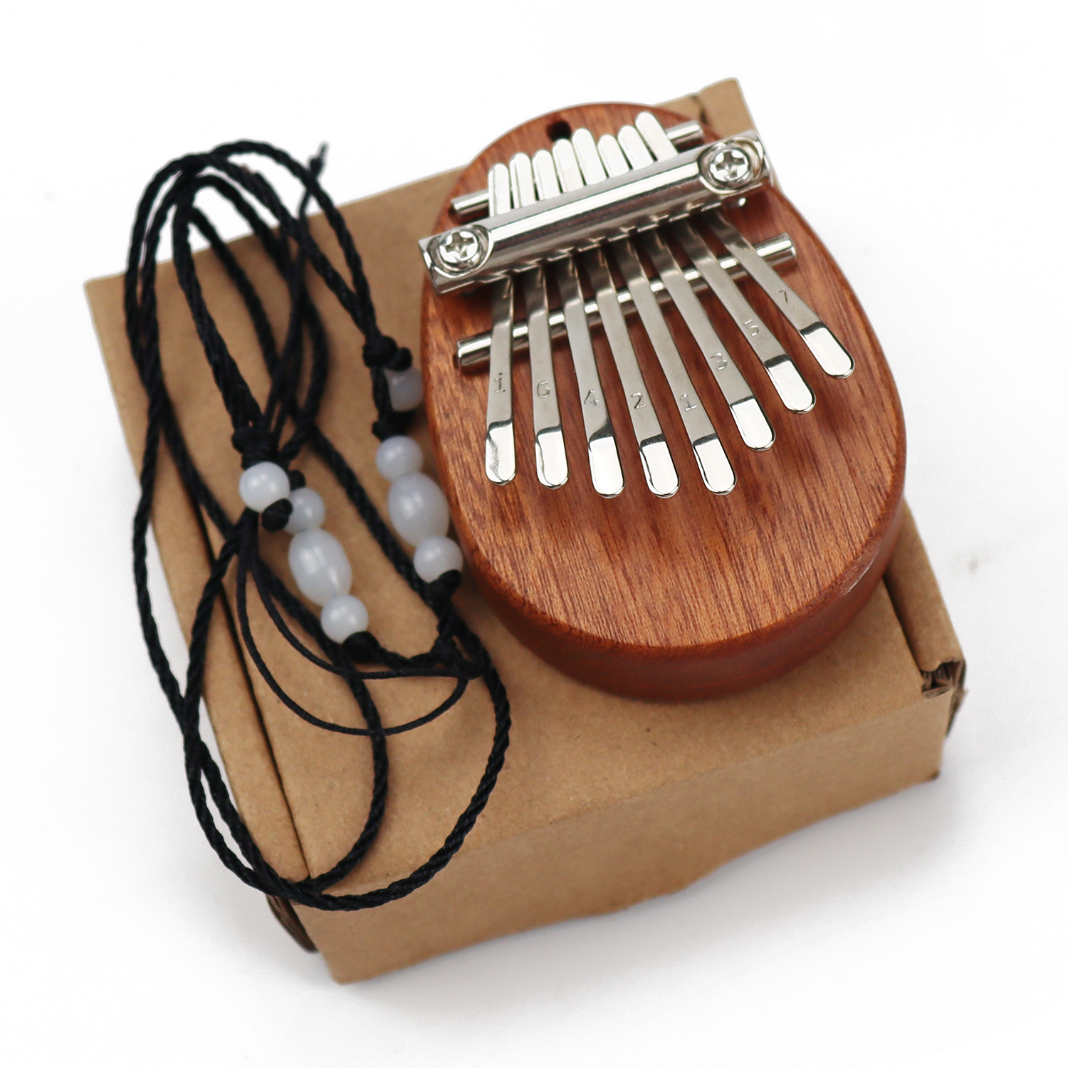 Mini piano à pouce Kalimba 8 touches, portable en bois massif Mbira pour  enfants et adultes, cadeaux musicaux de poche pour débutants avec chaîne :  : High-tech