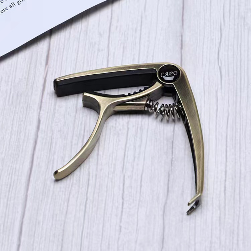 Dual purpose Zinc Alloy Guitar Capo Easy Transposition Folk Temu