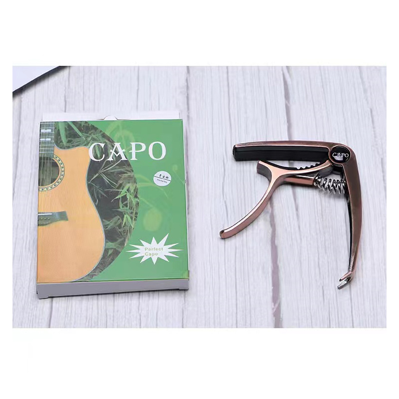 Dual purpose Zinc Alloy Guitar Capo Easy Transposition Folk Temu