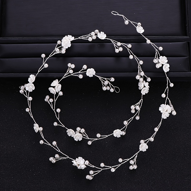 

Bijou de cheveux long en argent avec perles et fleurs artificielles