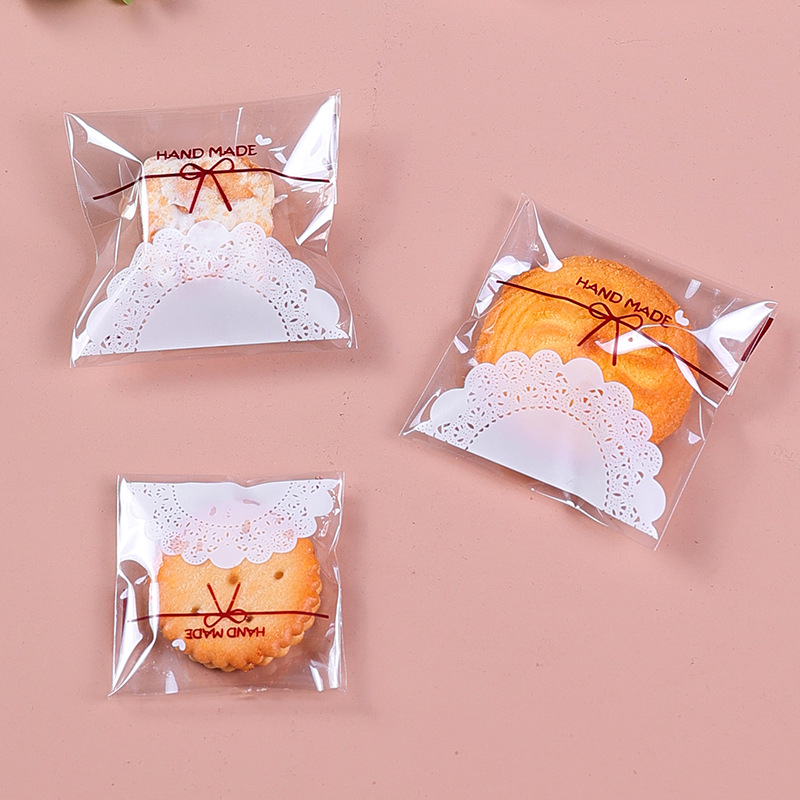 100pcs elegant lace bow print self   treat bags transparent white     candy   safe plastic ideal for weddings gifts baking packaging details 0