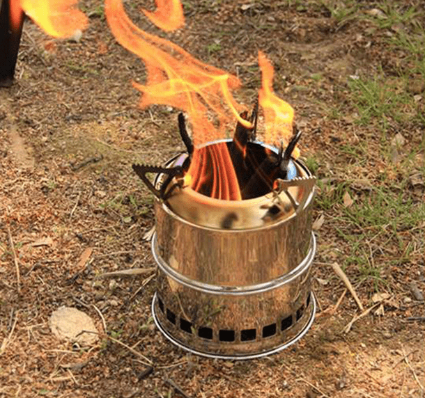 A Mini Portable Camping Stove for Outdoor Adventures: Compact, Made of Stainless Steel, And Designed for Burning Wood - Perfect for Your Next Adventure!