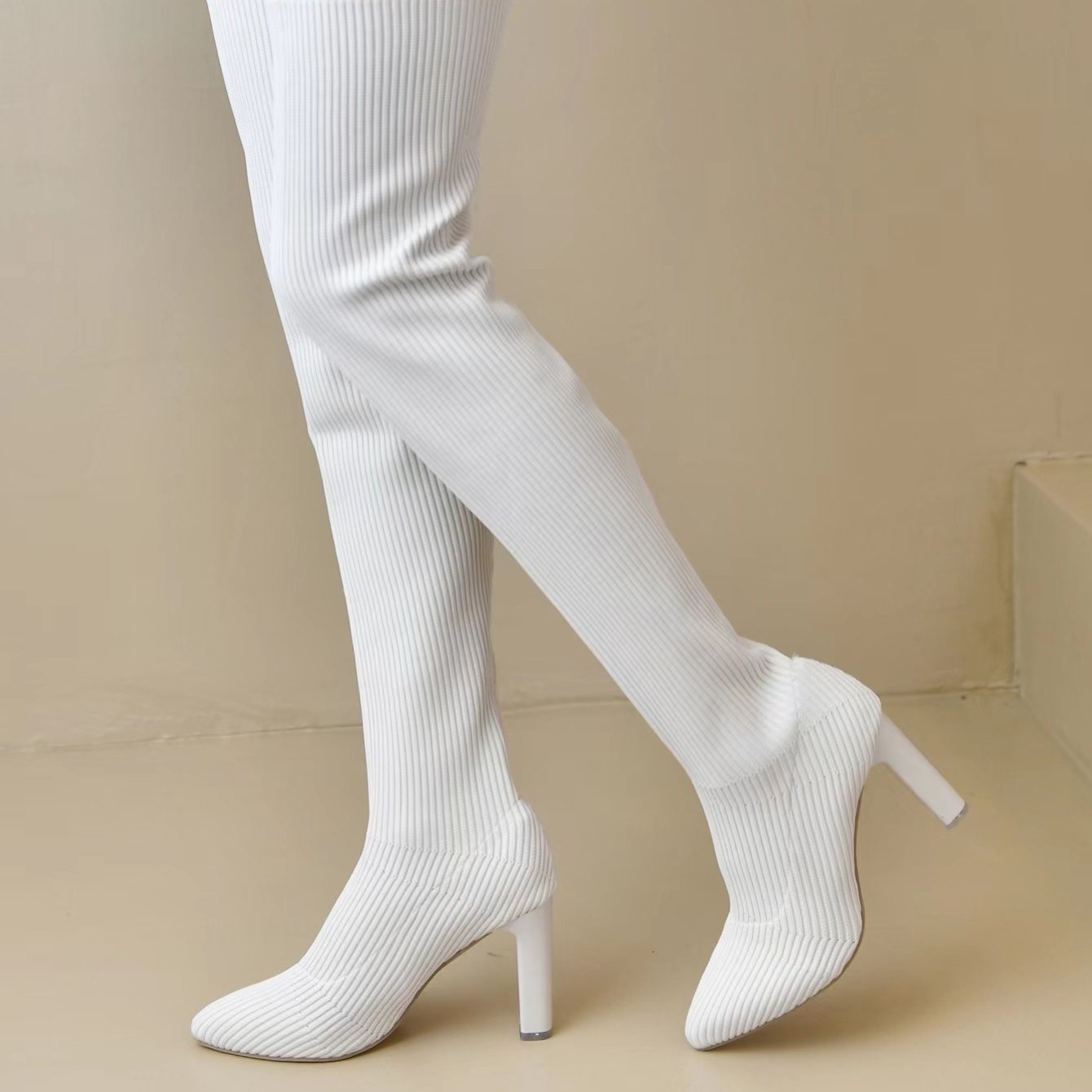 cream colored thigh high boots