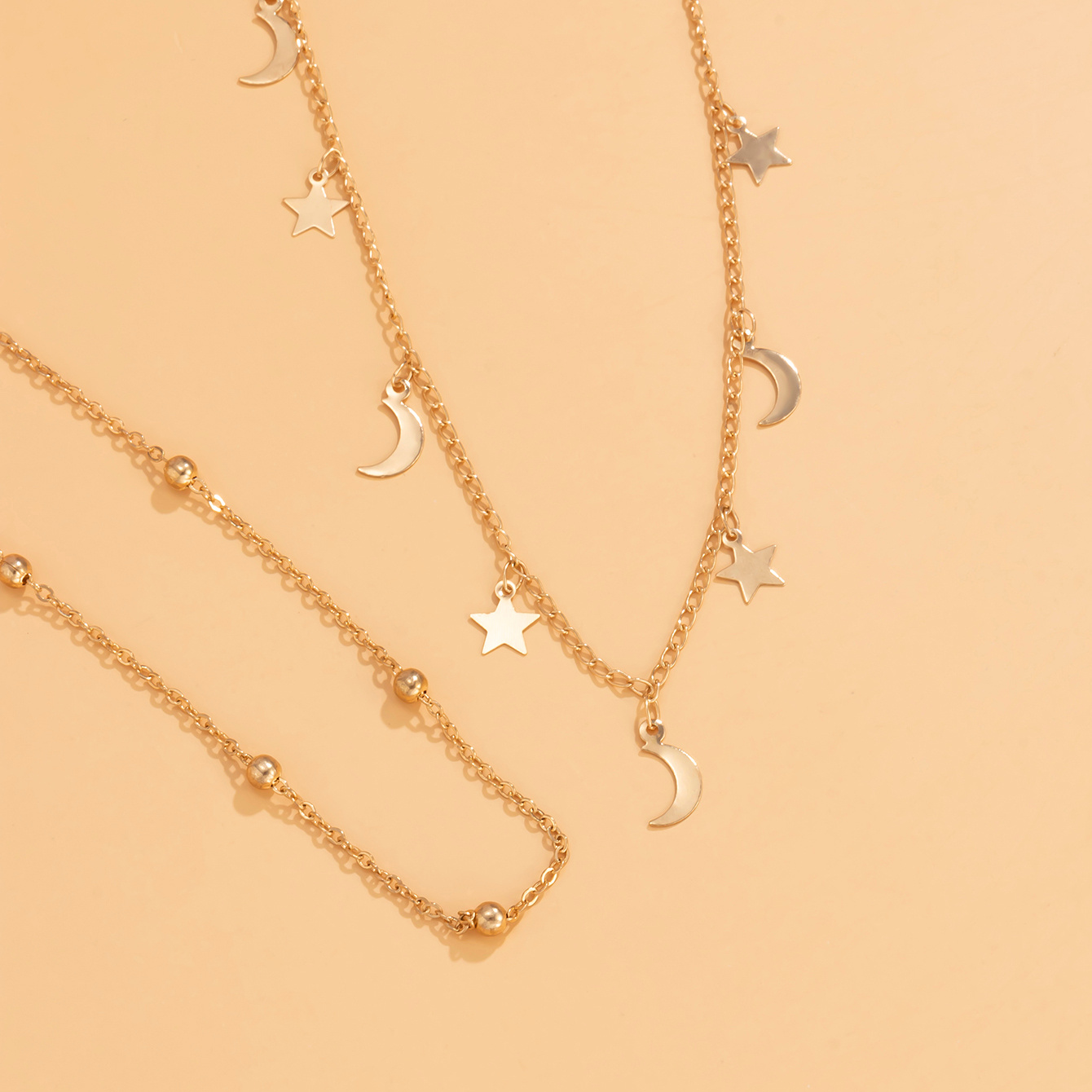 2pcs Star Moon Charm Necklace Set