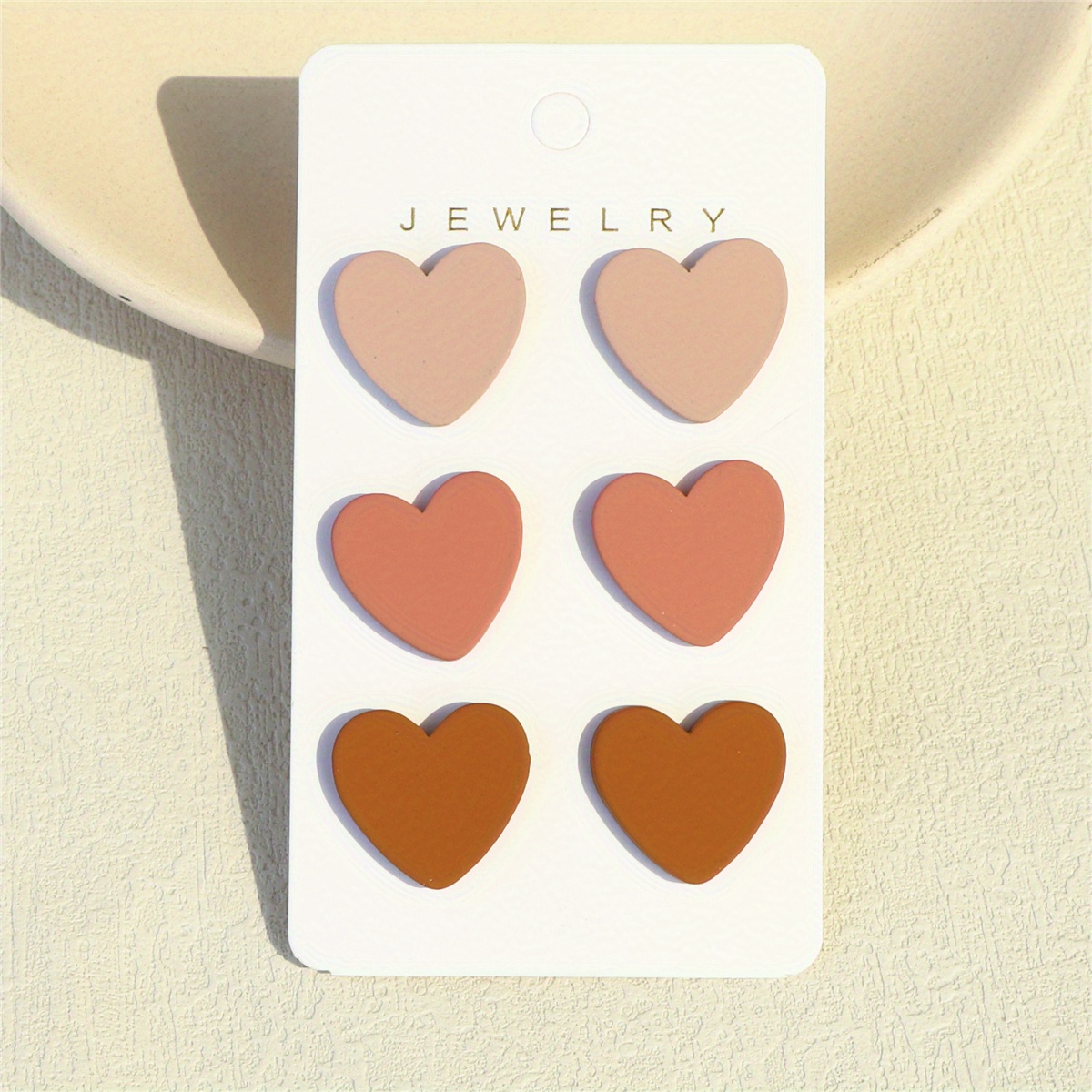 Image of Set Of 3 Pairs Of Heart-shaped Acrylic Earrings In Khaki, Brown, And Clay Textures For Women