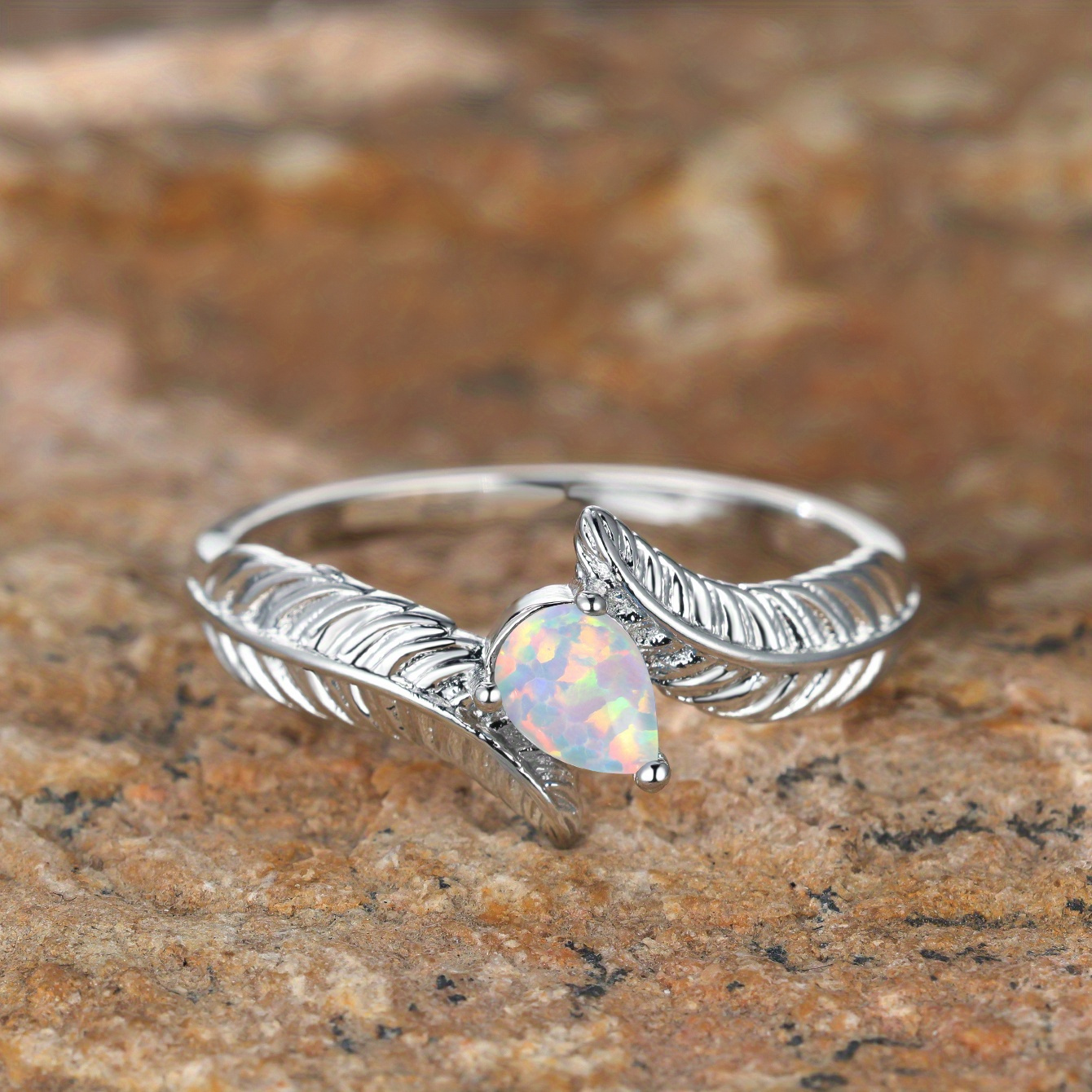 Teardrop opal clearance ring