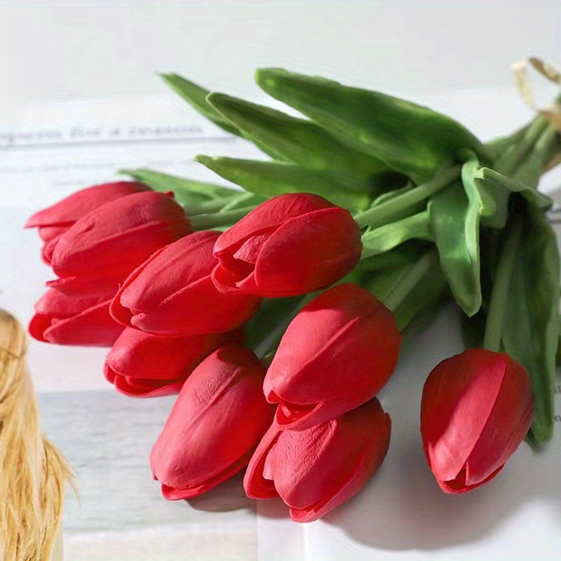 Red women underwear and spring Tulips flowers in pink tones . Red