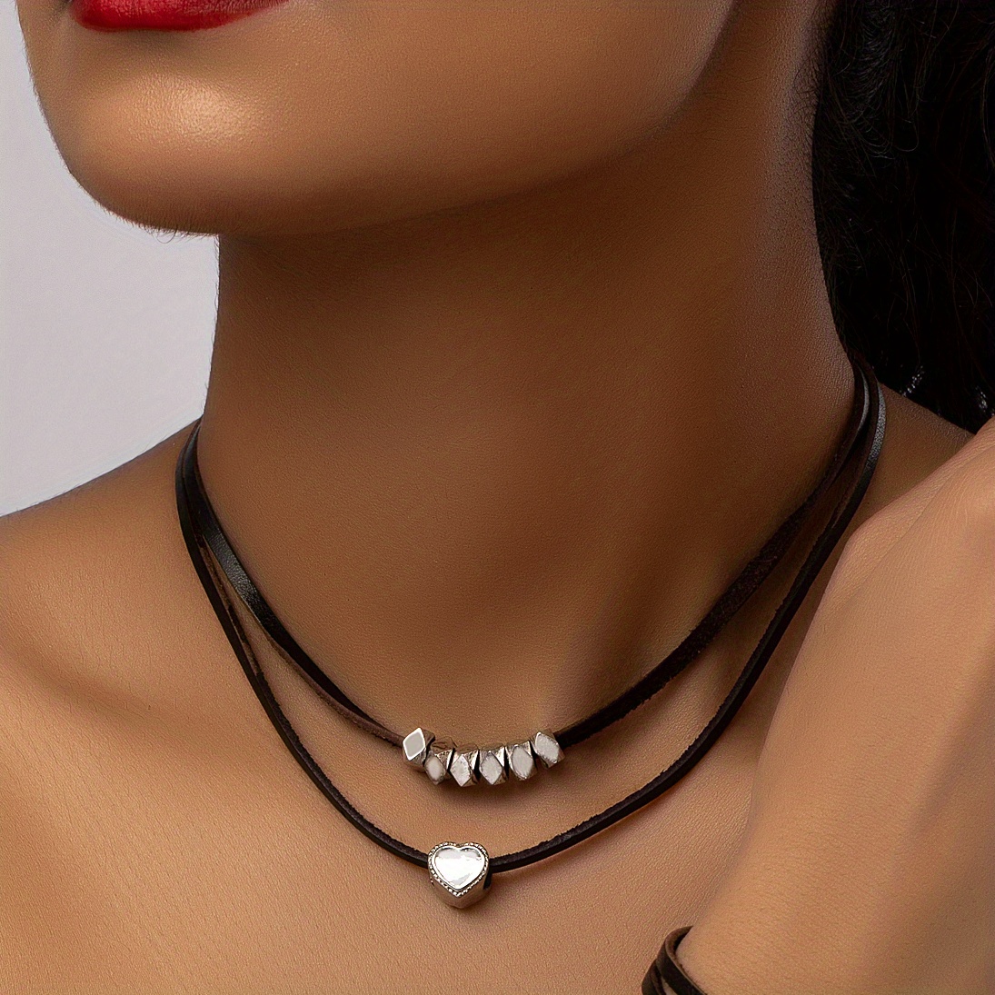 Image of A Bracelet And A Necklace Set Featuring A Minimalist Bohemian Style With Beaded Heart Designs On Leather, Wear Or As A Gift