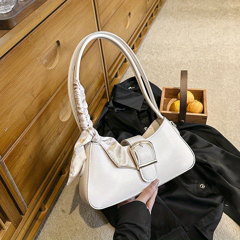 Dissona leather bag, Women's Fashion, Bags & Wallets, Purses