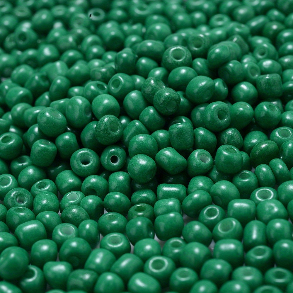 Preciosa Czech glass seed bead 15/0 Dark Green Transparent glass