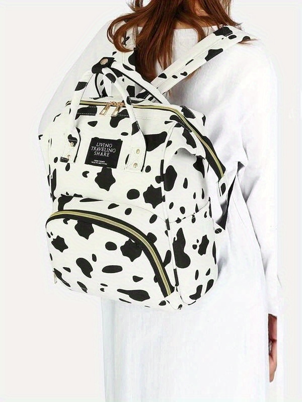 Cow print hotsell backpack diaper bag