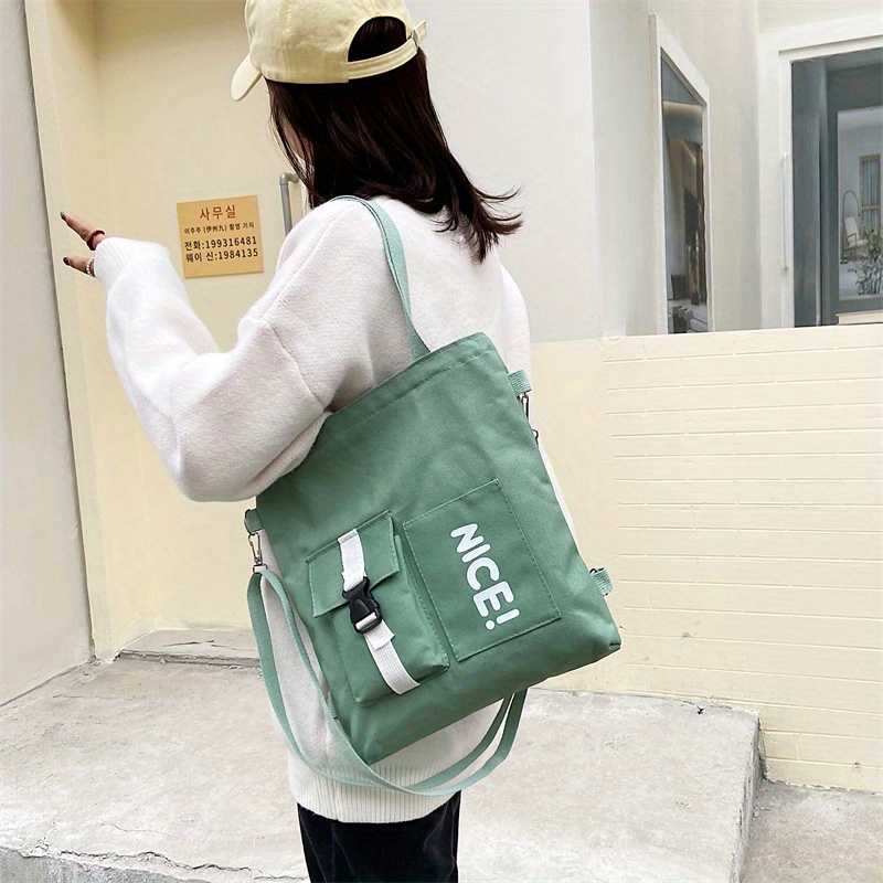 Adjustable shoulder strap logo lettering canvas shoulder bag