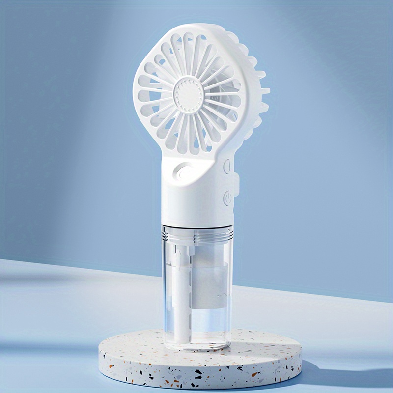 Generic Mini ventilateur avec Brumisateur,Veilleuse LED,électrique Portable  rechargeable à prix pas cher