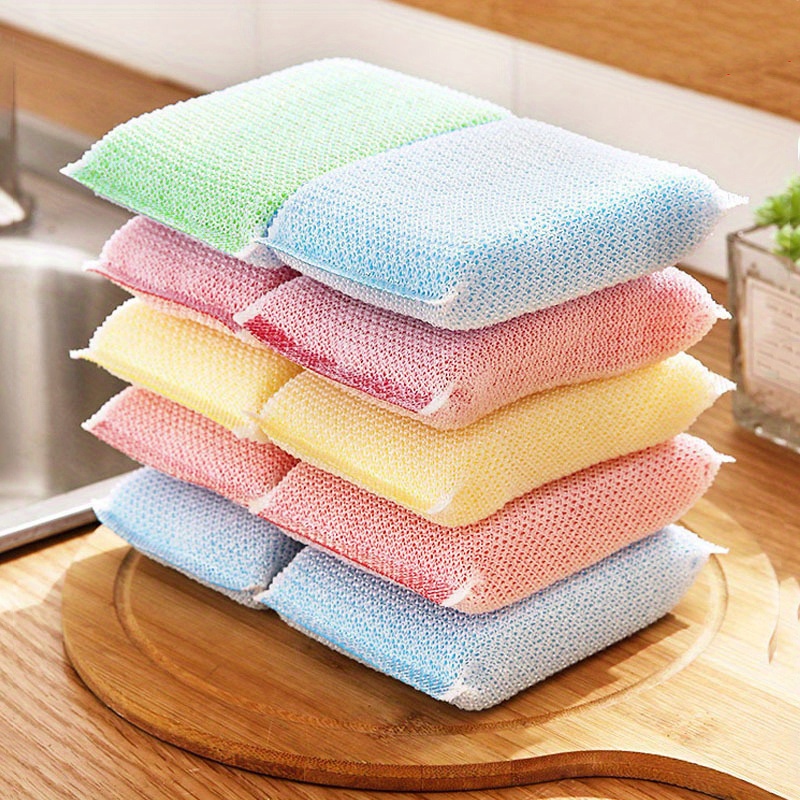 Metallized fiber foam sponge for dishes and housework. New silver foam  sponge for dishwashing on a kithen table. Purity and household chores Stock  Photo - Alamy