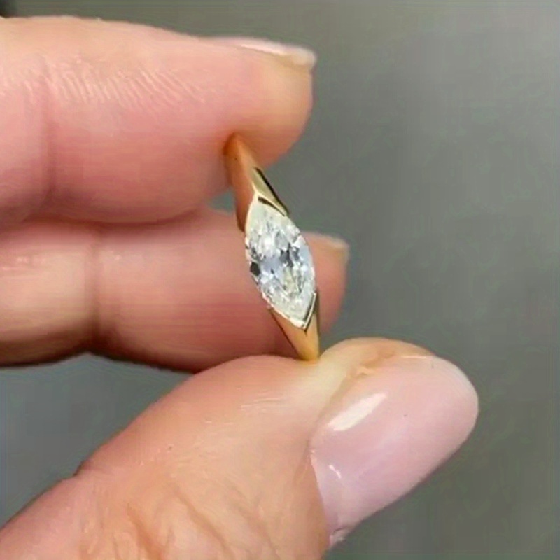 Image of Simple & Elegant Leaf-shaped Zirconia Ring For Women - Perfect For Engagement, Wedding, Anniversary | Copper With Kc Golden Plating | Ideal For Daily Wear & Parties