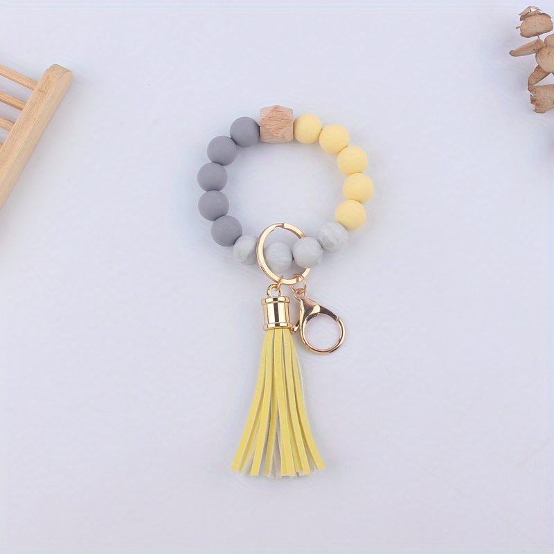 Wave Silicone Bangle Keychain Bracelet Pu Tassel Pendant Keychain Fitness  Bracelet Wrist Keyring For Women Car Keys Bag Charms Accessories - Temu