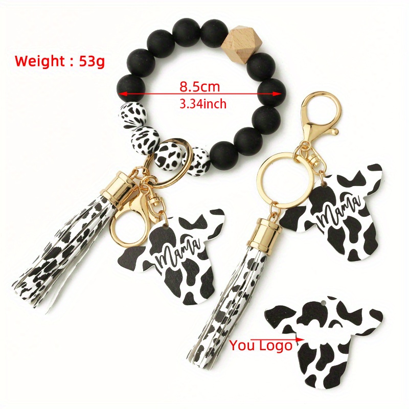 Wholesale Cow Print Leather tassel Cow head wood shavings Charm Tassel  keychain Retro geometric cow shape keyring wristlet From m.