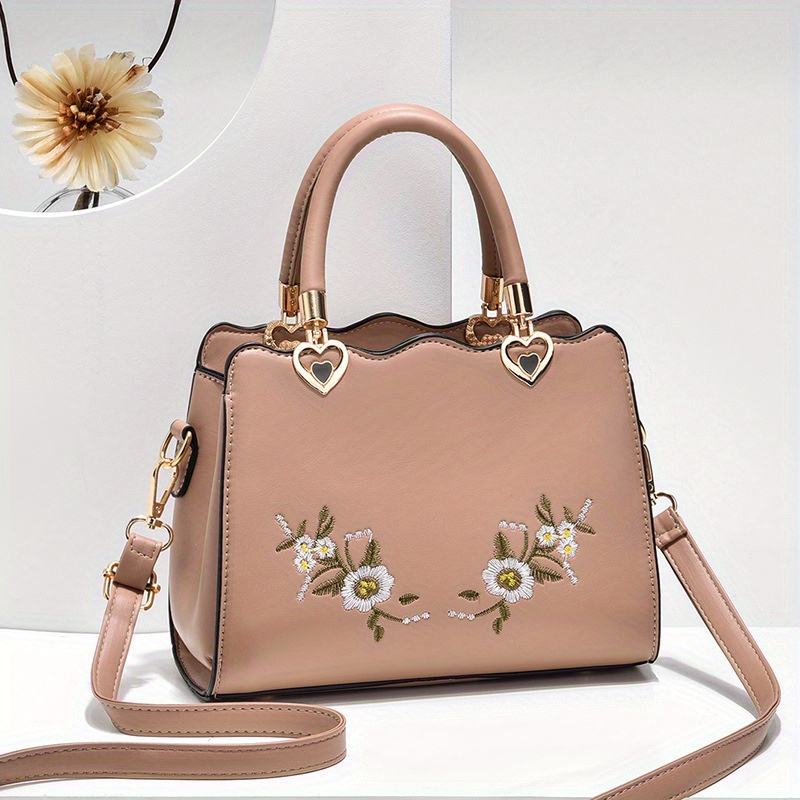 Leather embroidered bag hot sale