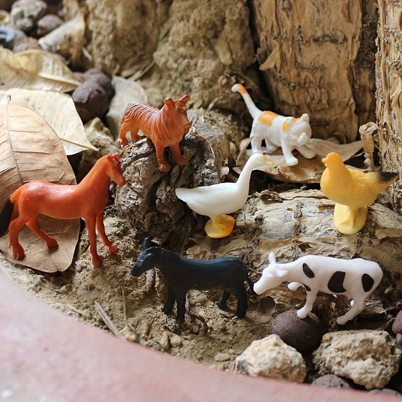 Farm Animal Toys in the sandbox 