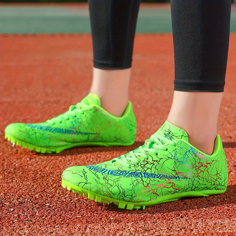 Zapatos profesionales de atletismo para hombre y mujer, ligeros, con 7  clavos, para atletismo, con suela dura de poliuretano termoplástico (color