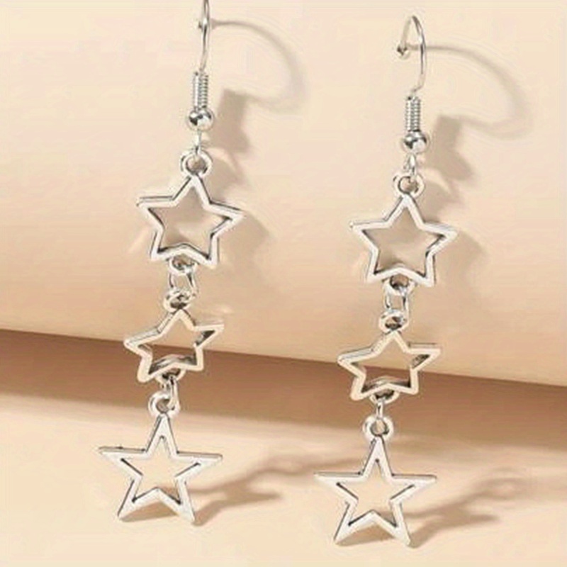 A Pair Of Stylish Openwork Five-pointed Star Earrings