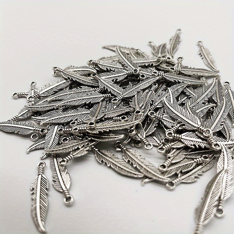 Image of 50pcs Charms Double Sided Feather 27x7mm Antique Making Pendant Fit, Vintage Tibetan Silvery Color, Diy Handmade Jewelry, Alloy Material