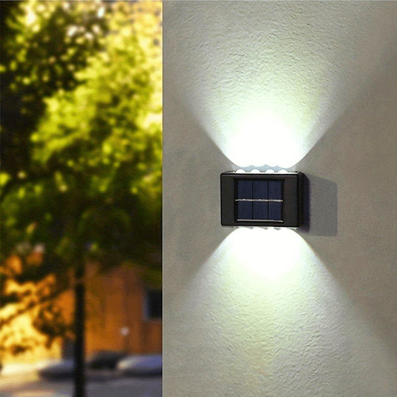  ASLIDECOR Luces solares para valla hacia arriba y hacia abajo,  paquete de 2 pequeñas luces solares impermeables, iluminación blanca cálida  para cubierta que ilumina al aire libre para patio, cobertizo 