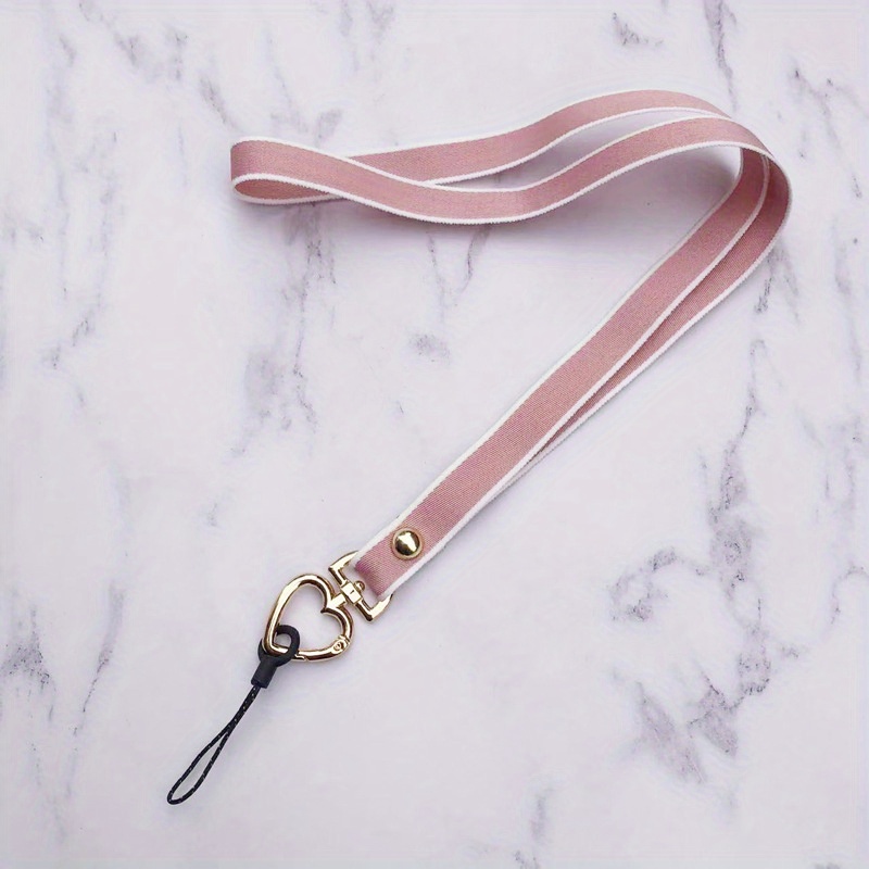 Add To Your Look With This Heart Lanyard!