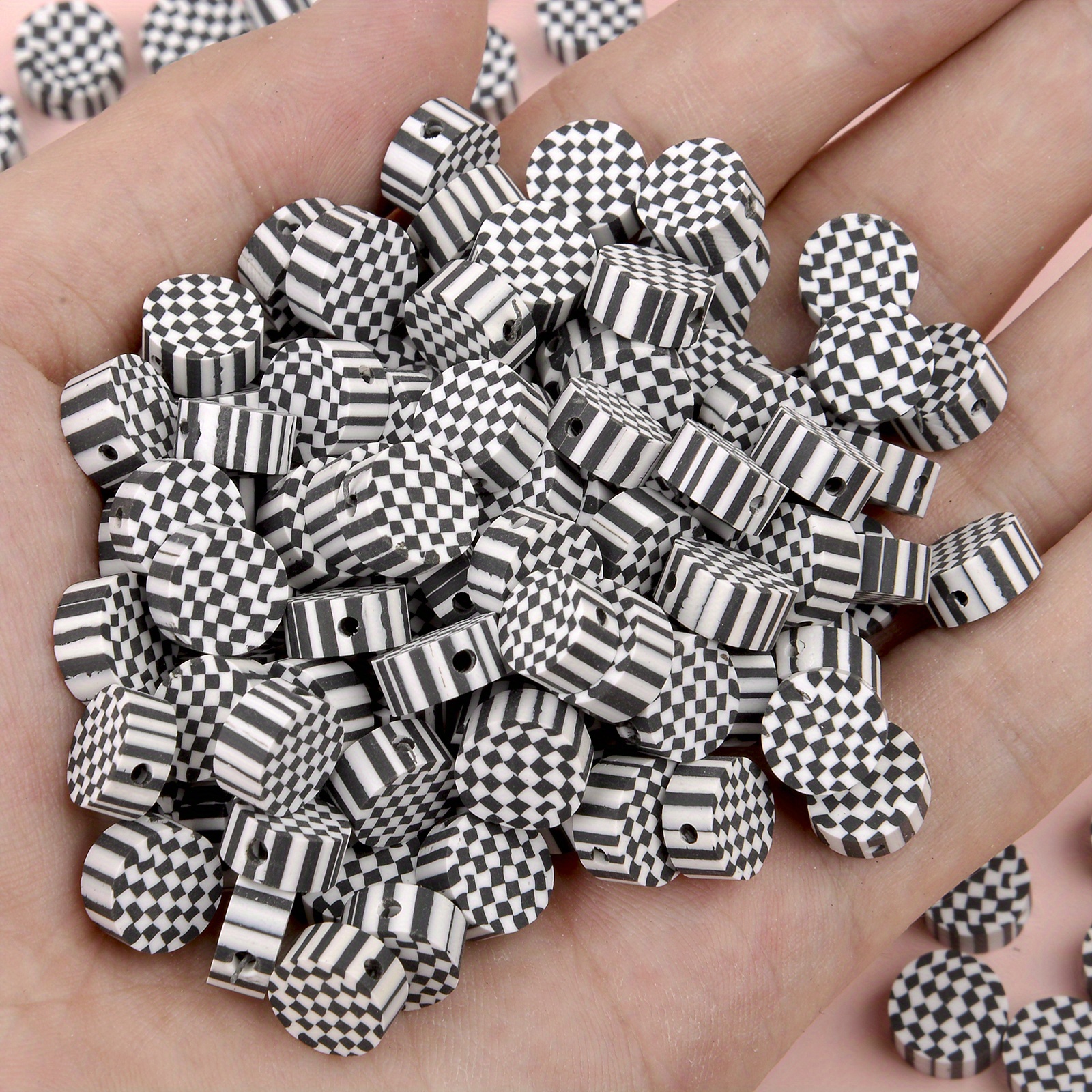 12 Packs: 12 ct. (144 total) Black & White Stripe Clay Round Beads