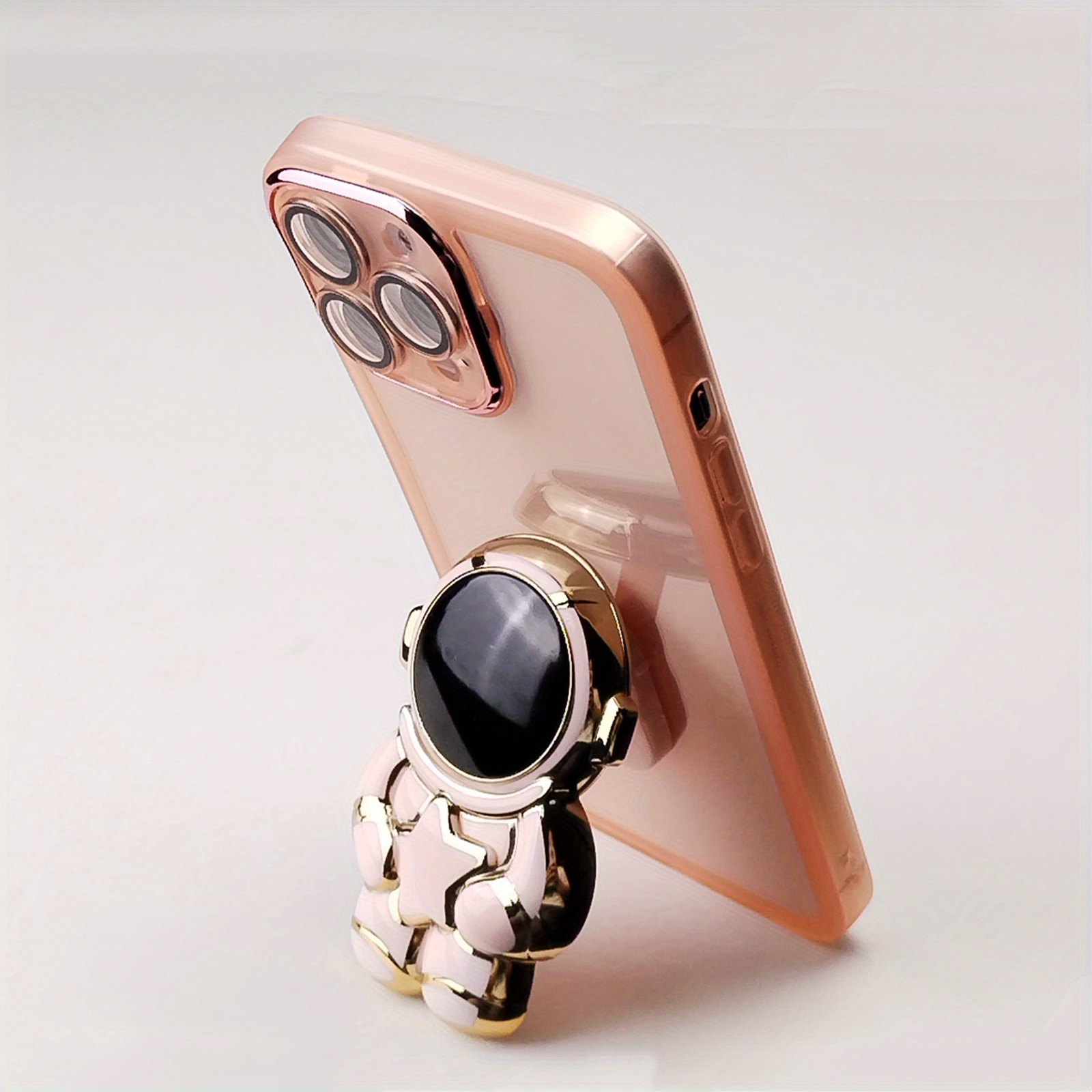 Protector iPhone 13/14 con soporte astronauta color rosa - en