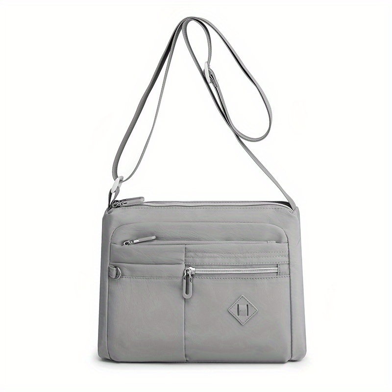 Women's crossbody bag in leather color light grey