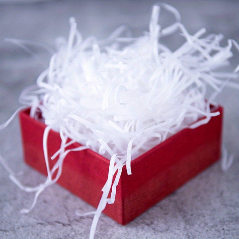 White Gift Wrapping Filler Paper Shreds In Colored Raffia And