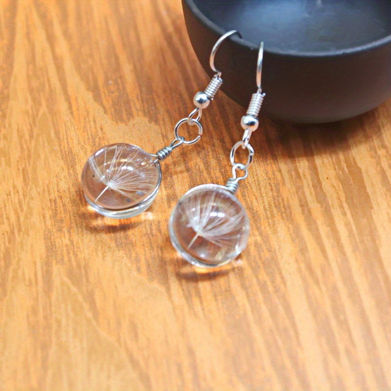 Dandelion crystal store ball earrings