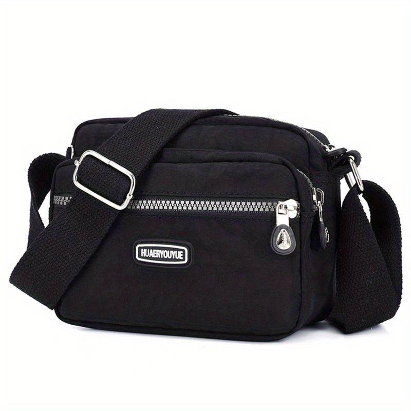 Small black nylon crossbody on sale bag