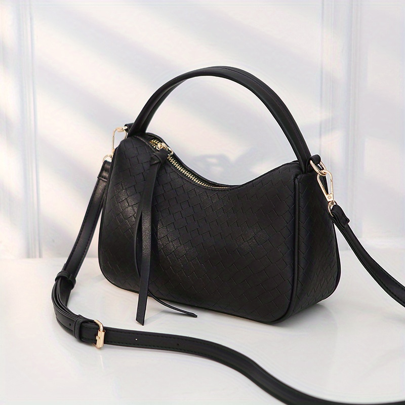 Gucci, Linea Guccissima A Large Black Leather Hobo Bag