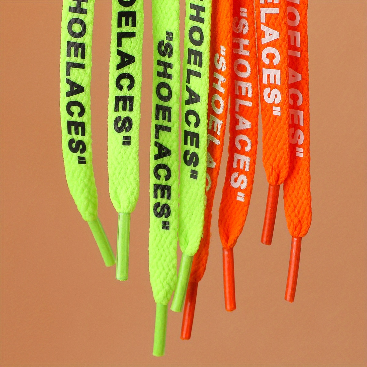 Fluorescent yellow laces with contrasting orange 'Laces' lettering