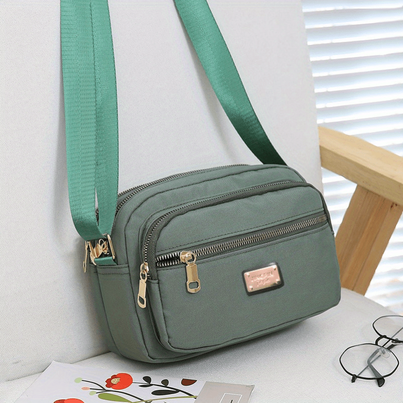 Sac bandoulière femme en nylon souple multi poches