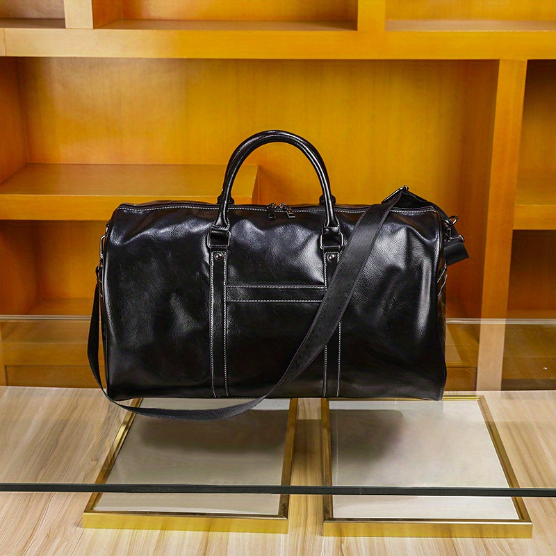 Vixen Large Black Leather Duffle Bag for the Modern Traveller