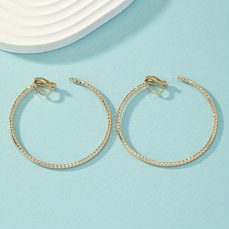 Image of Vintage Golden-tone Twisted Hoop Earrings For Women - Chic Retro Geometric Design, Alloy Material, & Parties, Quirky Earrings