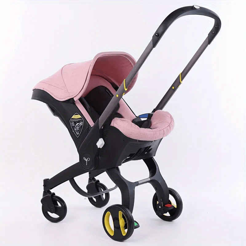 pink and black baby carriage