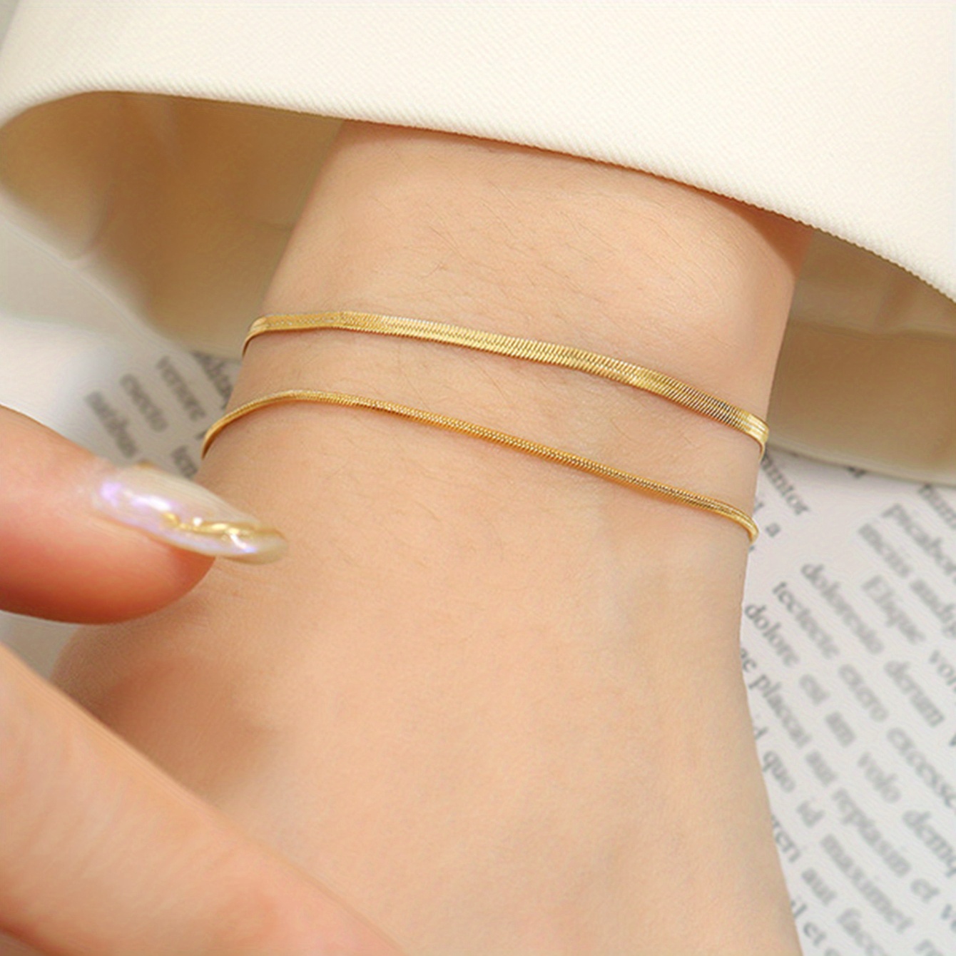 Simple hand chain on sale gold