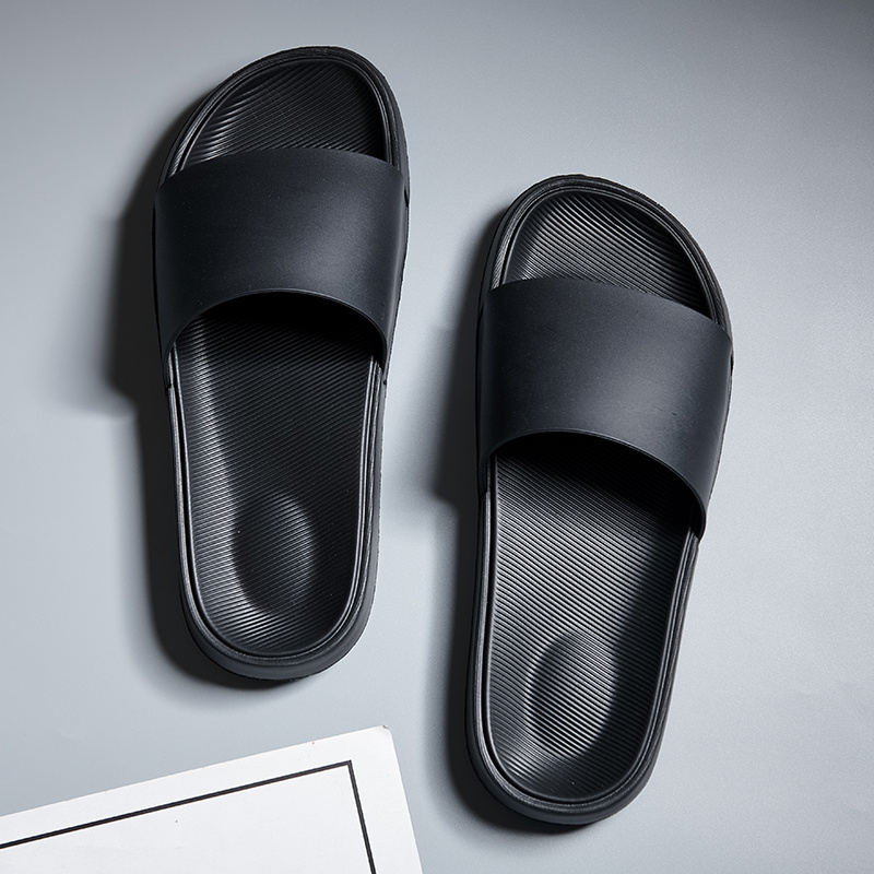 Plain black nike store slides