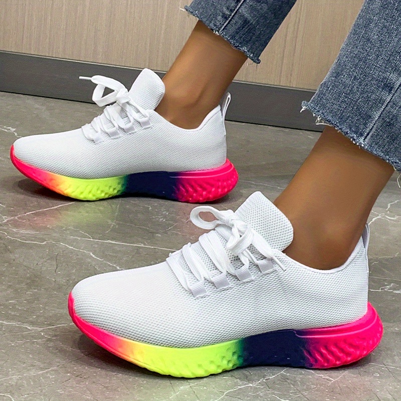 White sneakers best sale with rainbow soles