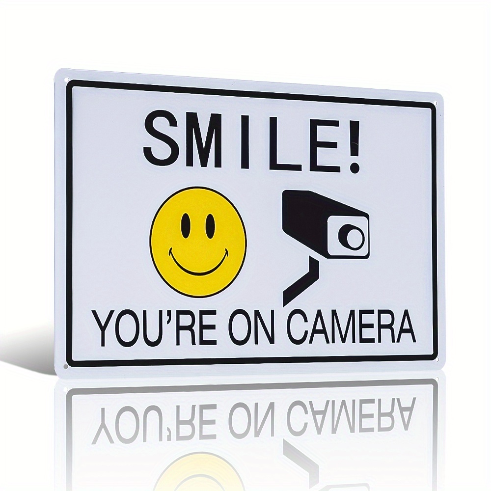 smile cctv sign