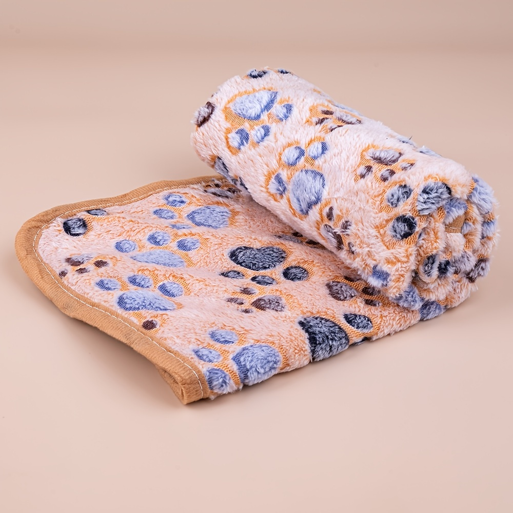 Cozy & Cute Winter Pet Blanket - Keep Your Dog & Cat Warm with a Fleece Paw Print Blanket!