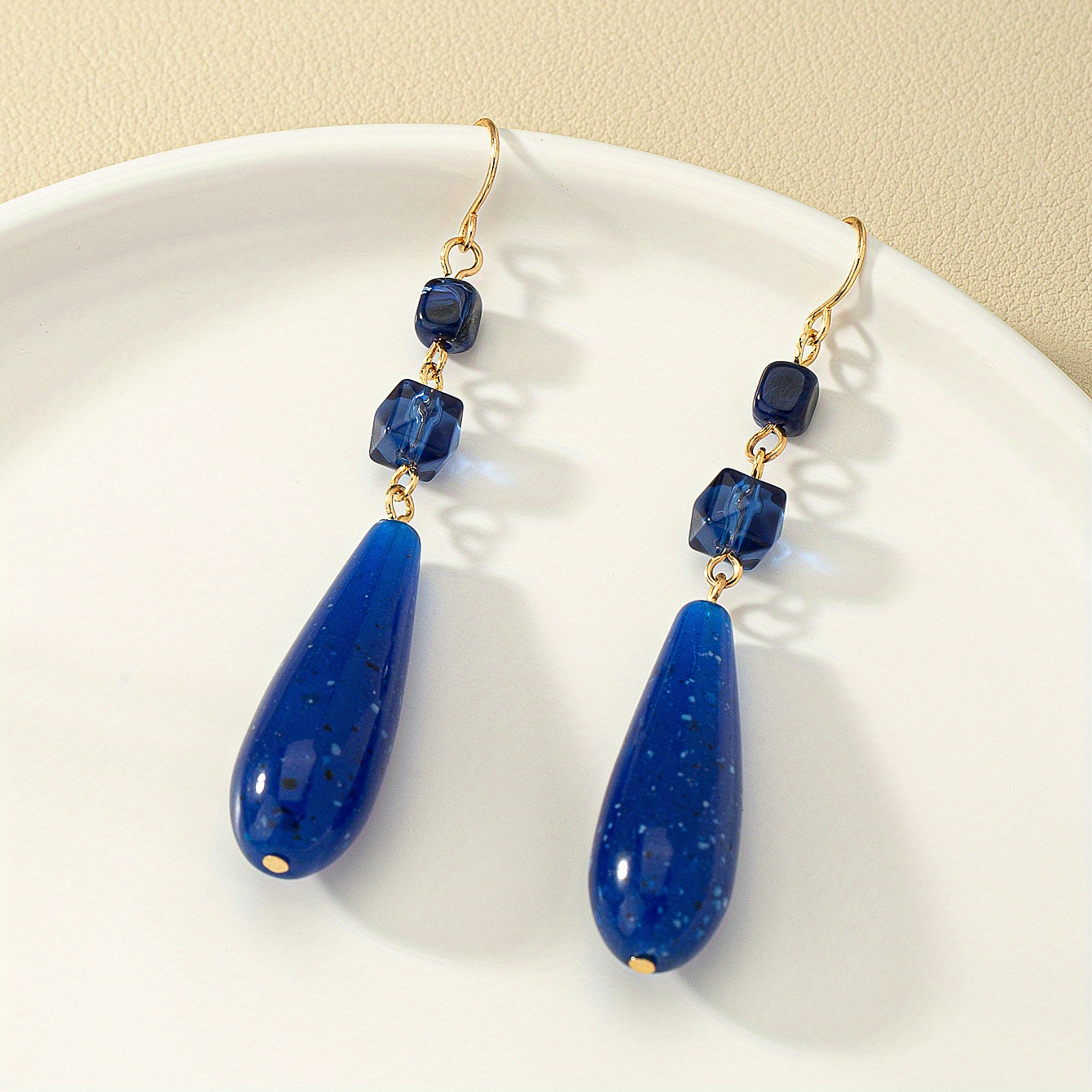 Image of A Pair Of Elegant Long Royal Blue Teardrop Earrings In Bohemian Style, Perfect For Gifts And Everyday Wear