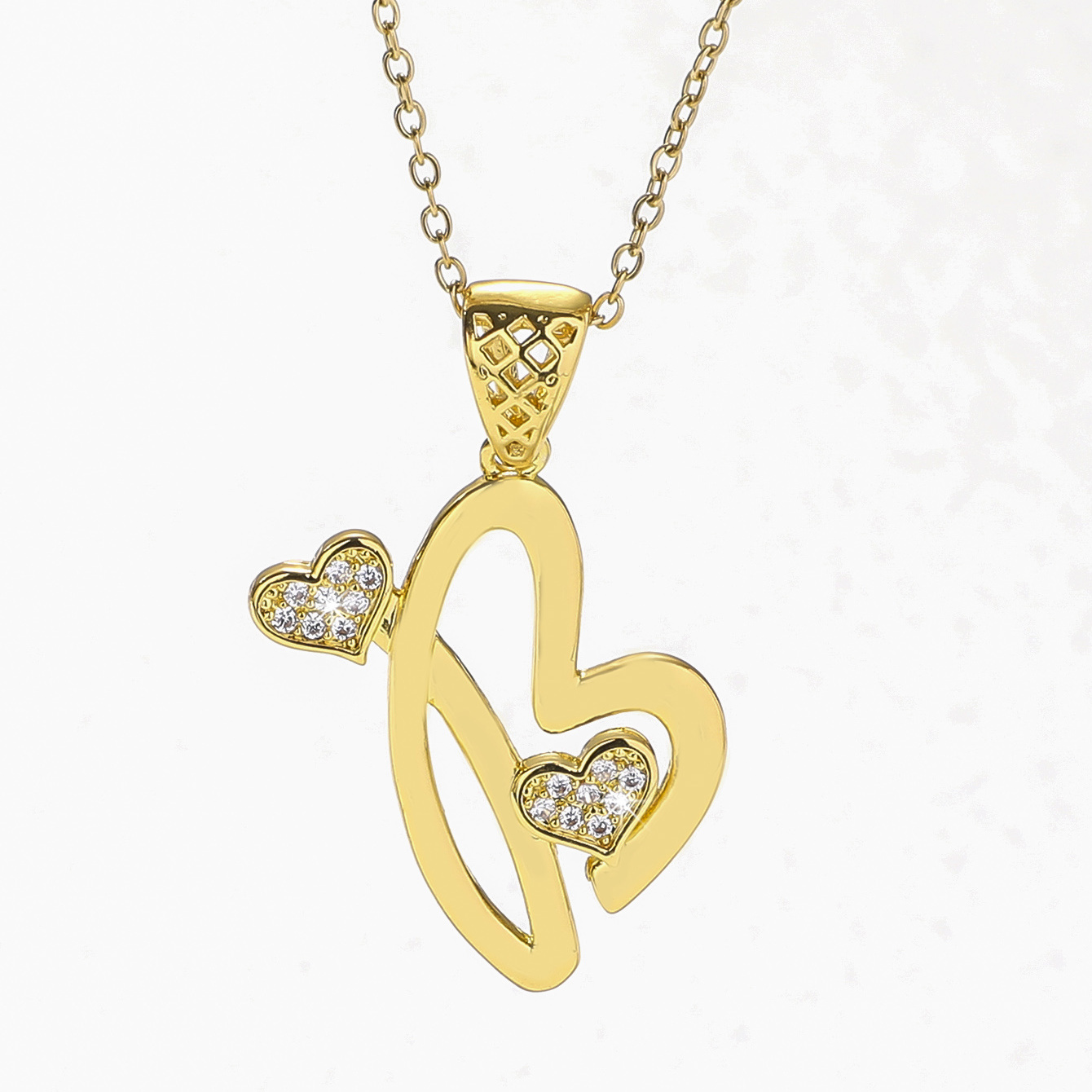 Charm pendant letter K with white stones gold plated