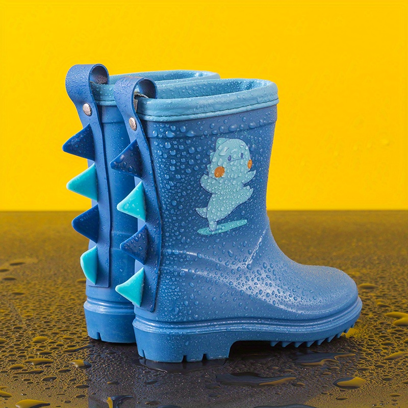 Botas de agua de color azul con estampado de dinosaurios