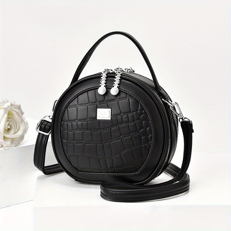 Round black discount leather crossbody bag