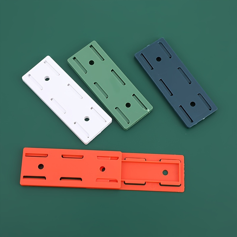 8 piezas de soporte adhesivo para enchufes sin perforaciones, soporte de  pared para regleta de alimentación, fijador de enchufe de escritorio